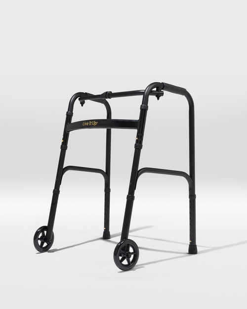 Black walker with wheels on a white background