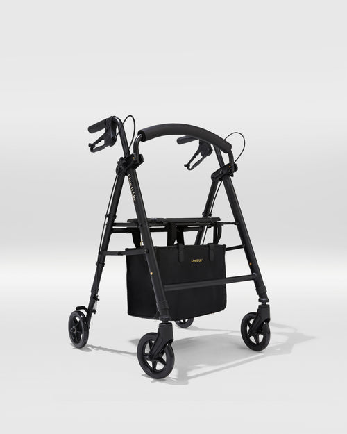 Black walker with basket on a white background