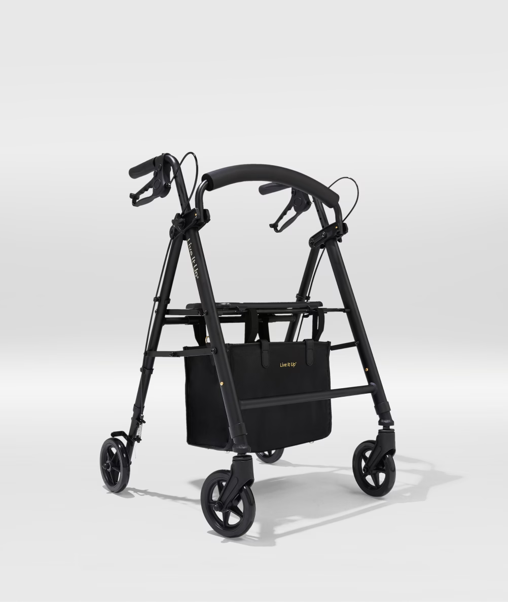 Black walker with a basket on a white background