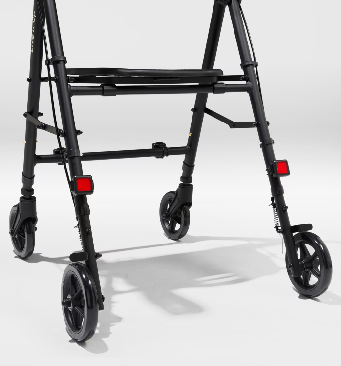 Black walker with wheels on a white background